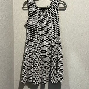 Black and white sleeveless dress, size medium, material is stretchy